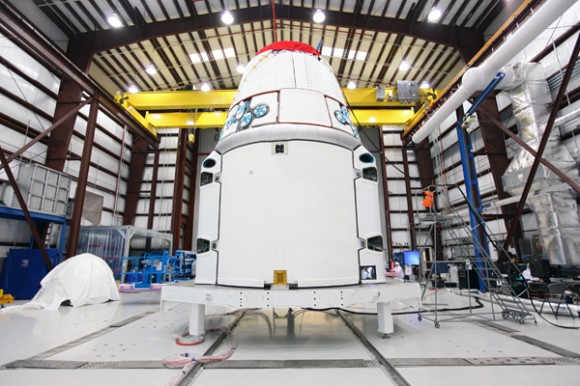 Dragon in the processing hangar at Cape Canaveral. (Credit: NASA/Kim Shiflett). 