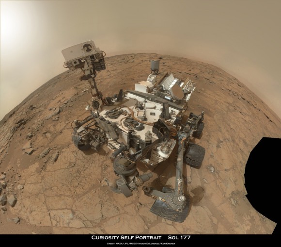 Curiosity Rover snapped this new self portrait mosaic this week with the MAHLI camera while sitting on flat sedimentary rocks at the “John Klein” outcrop where the robot just conducted historic first sample drilling inside the Yellowknife Bay basin, on Feb. 8 (Sol 182) at lower left in front of rover. The photo mosaic was stitched from raw images snapped on Sol 177, or Feb 3, 2013, by the robotic arm camera - accounting for foreground camera distortion. Credit: NASA/JPL-Caltech/MSSS/Marco Di Lorenzo/Ken Kremer (kenkremer.com) 