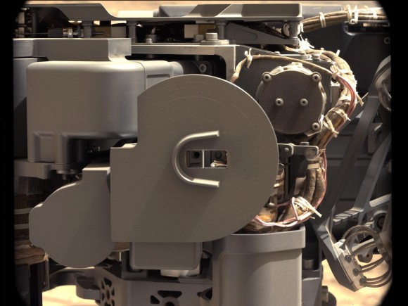 NASA's Mars rover Curiosity took this image of Curiosity's sample-processing and delivery tool just after the tool delivered a portion of powdered rock into the rover's Sample Analysis at Mars (SAM) instrument. This Collection and Handling for In-situ Martian Rock Analysis (CHIMRA) tool delivered portions of the first sample ever acquired from the interior of a rock on Mars into both SAM and the rover's Chemistry and Mineralogy (CheMin) instrument.   Credit: NASA/JPL-Caltech/MSSS