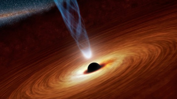 This artist's concept illustrates a supermassive black hole with millions to billions times the mass of our sun. Supermassive black holes are enormously dense objects buried at the hearts of galaxies. Image credit: NASA/JPL-Caltech 